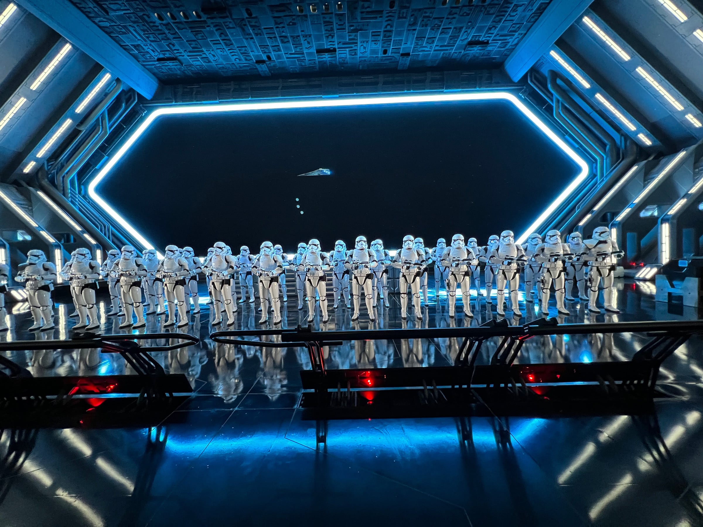 Rows of stormtroopers across the hangar.