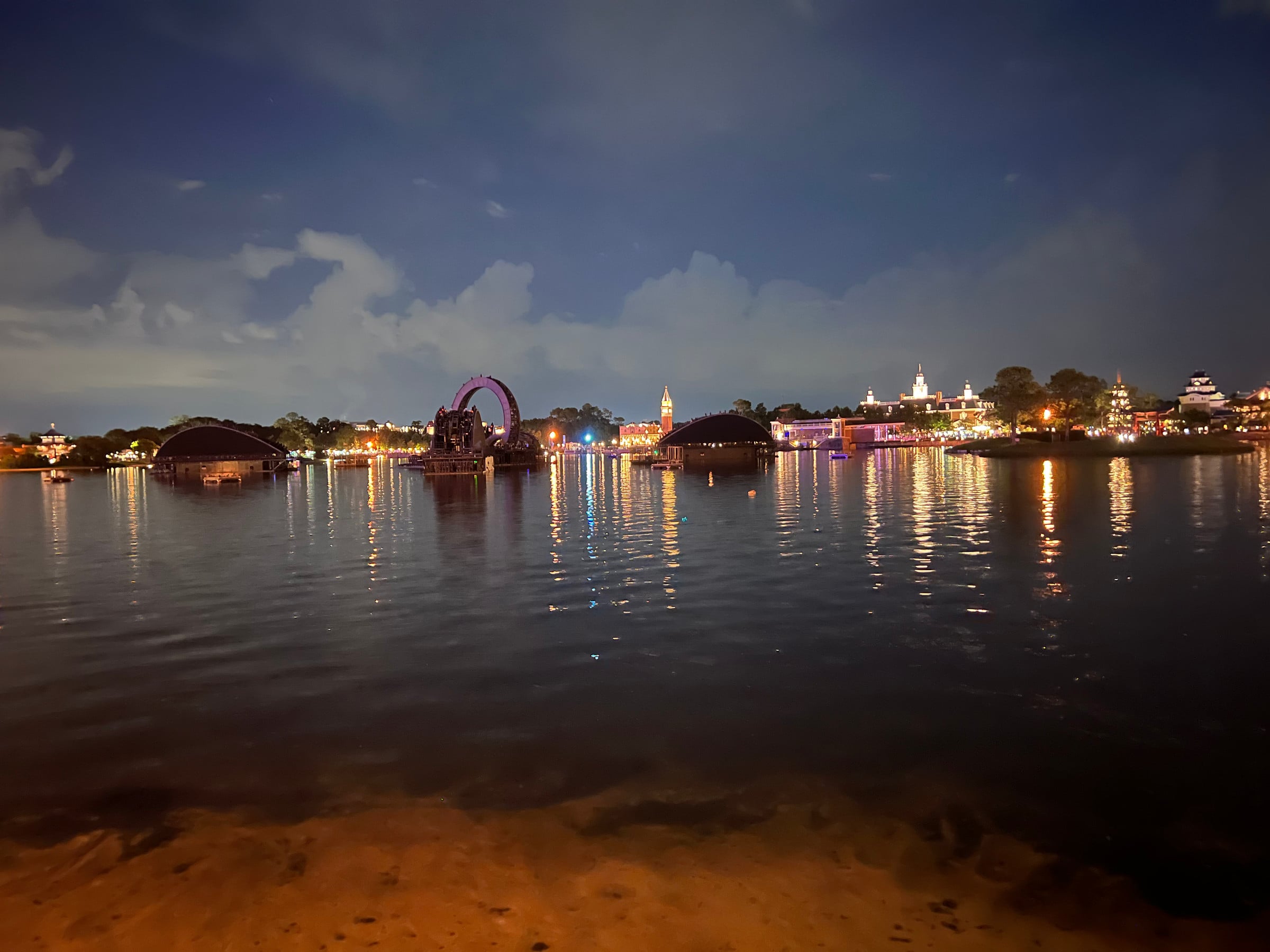The lights across World Showcase Lagoon.