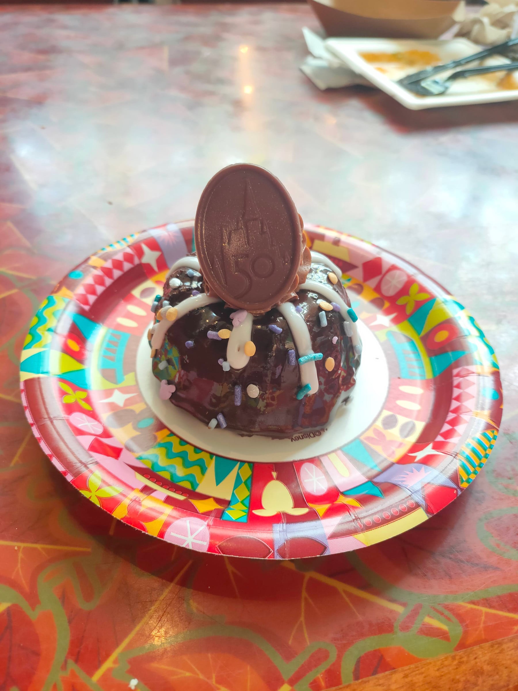 A Mickey-shaped chocolate dessert.