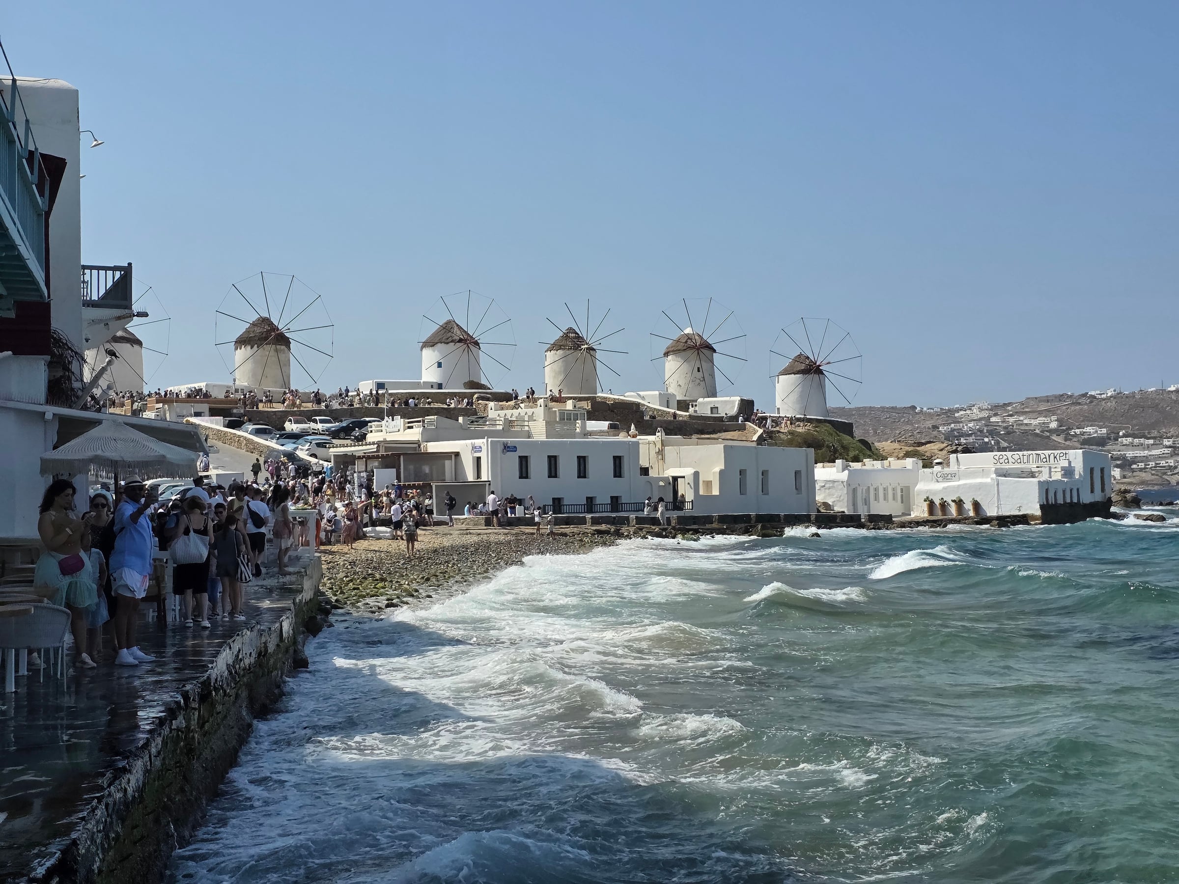 The sea beside Little Venice, with the windmills beyond.