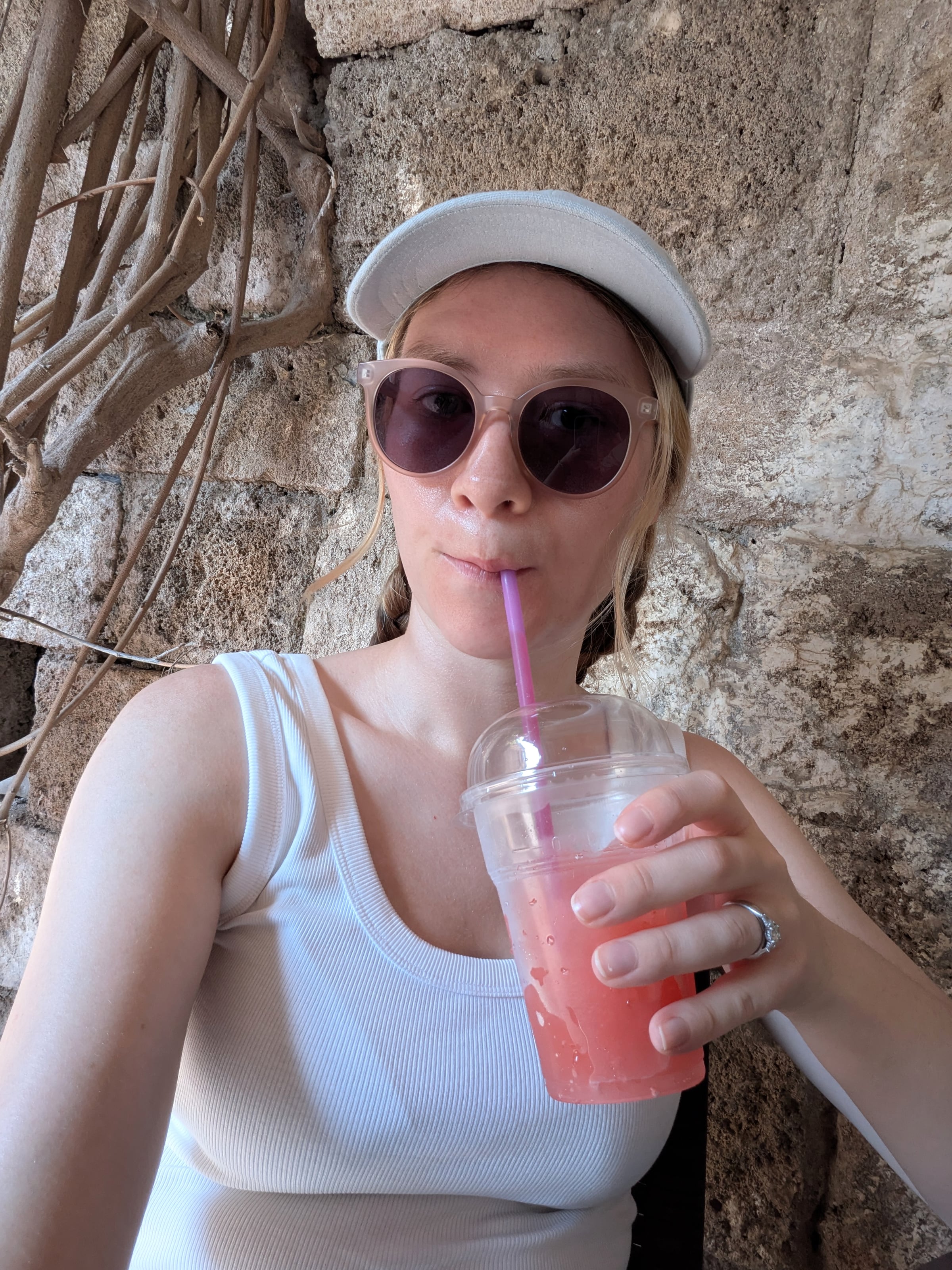 Lucy stopping for a drink in Rhodes.