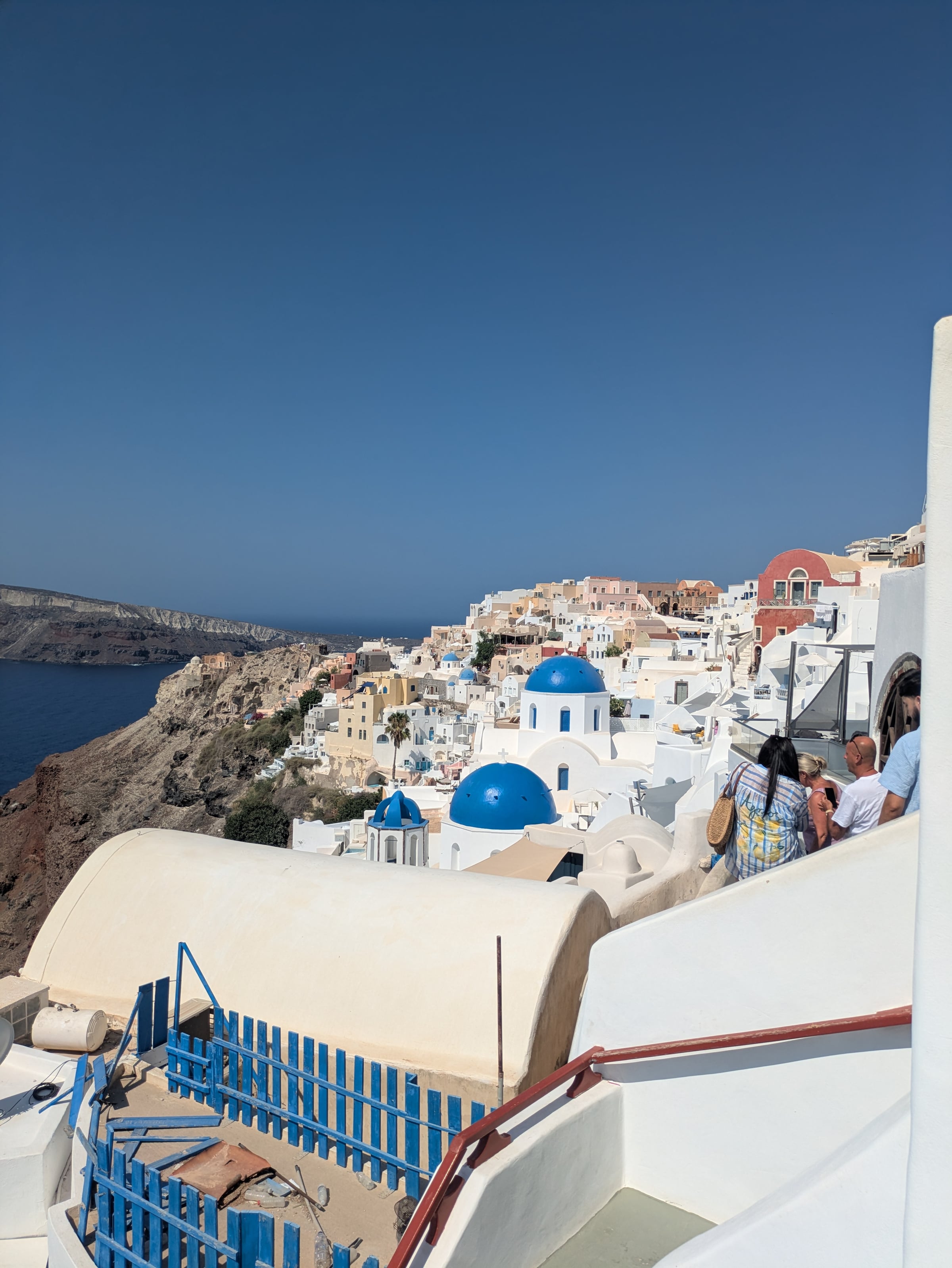 Blue domes and whitewashed buildings in Oia.
