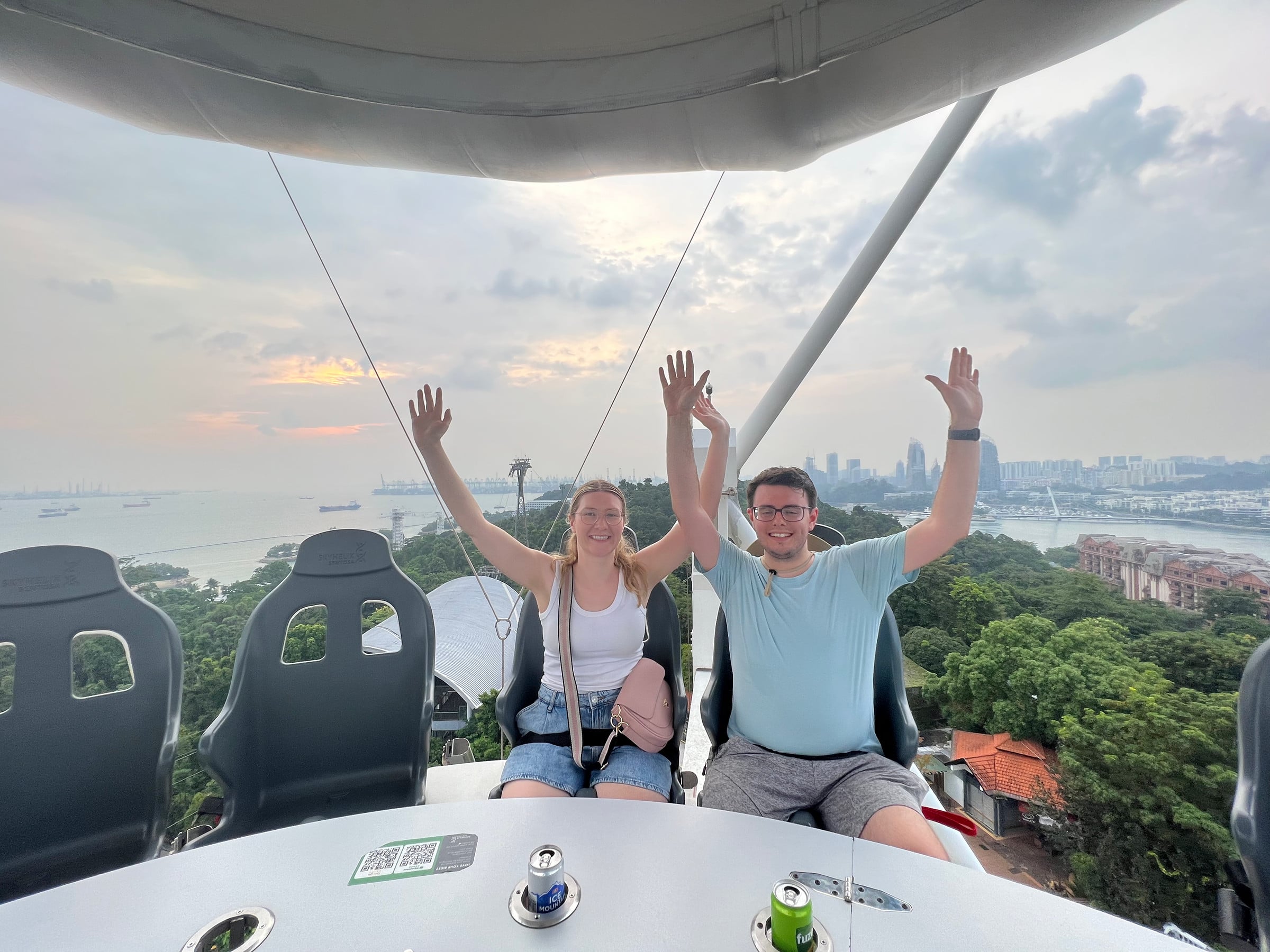 Feet dangling on SkyHelix Sentosa.