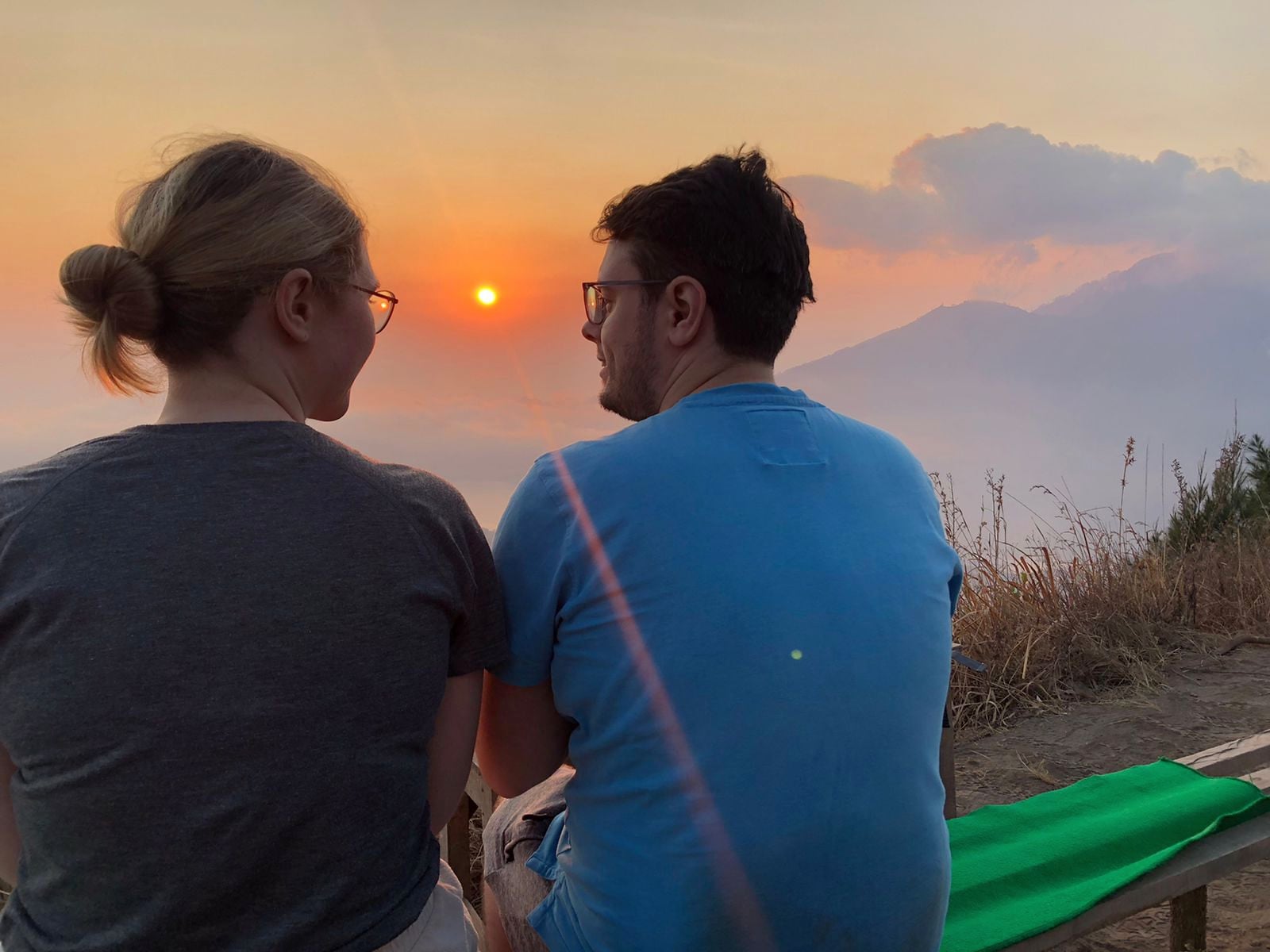 Sitting together and watching the sunrise.