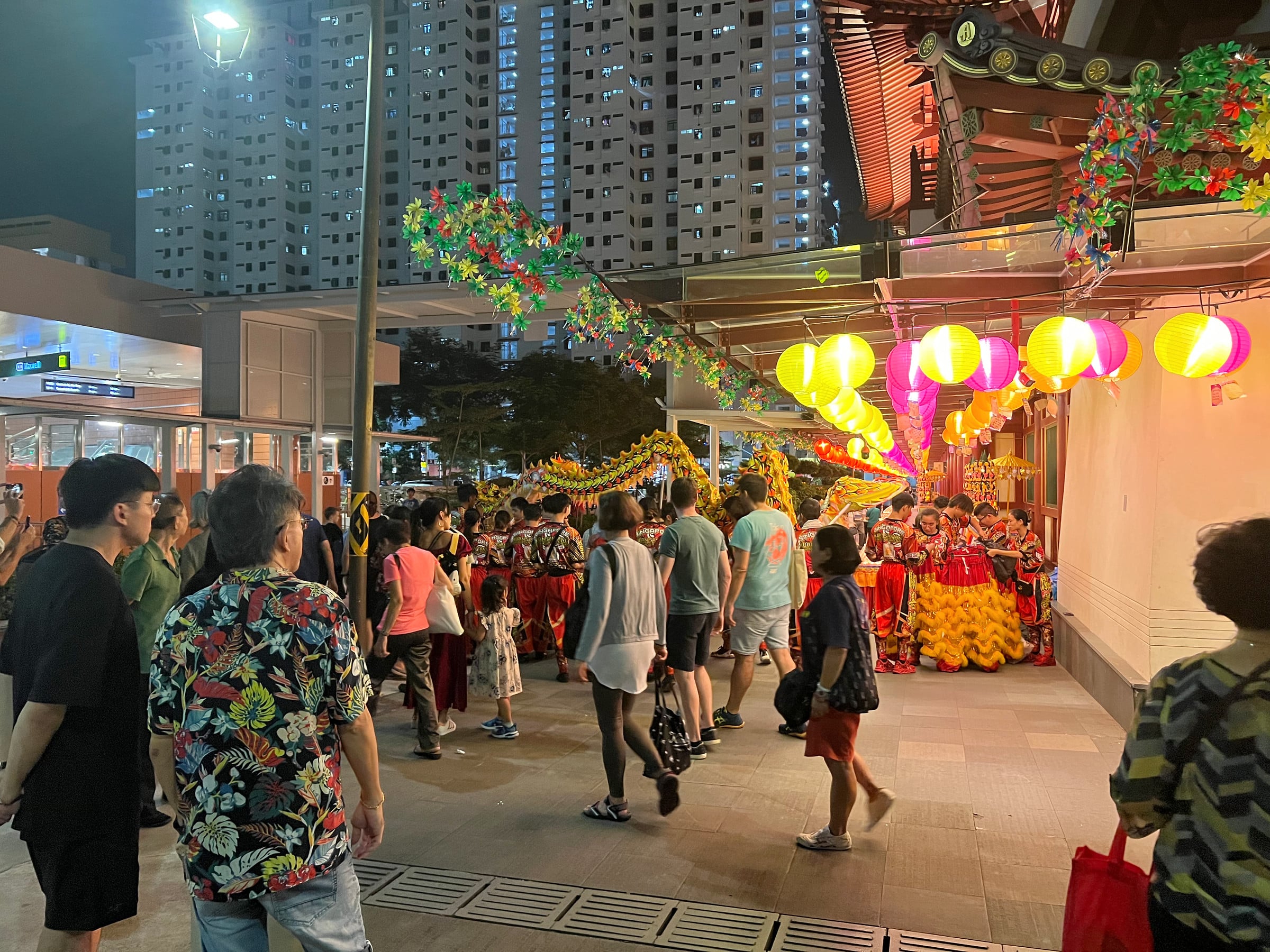 A dragon dance beside the Buddha Tooth Relic Temple.