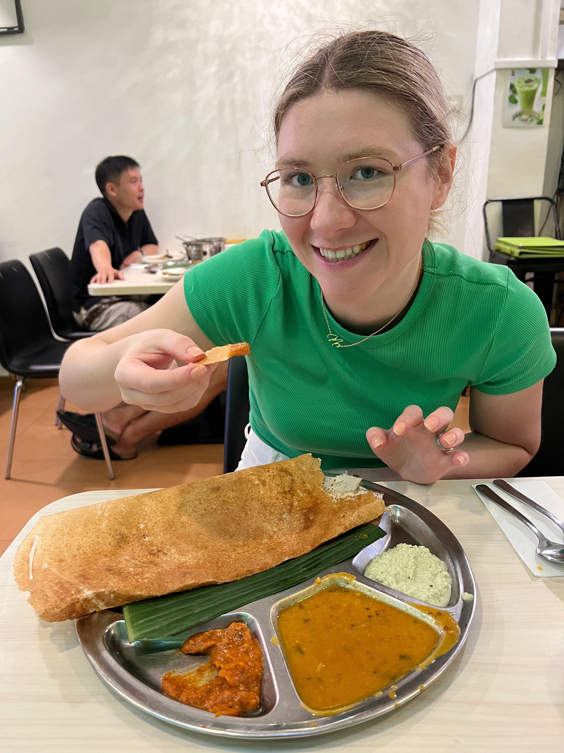 Lucy and a dosa that barely fitted on the tray.