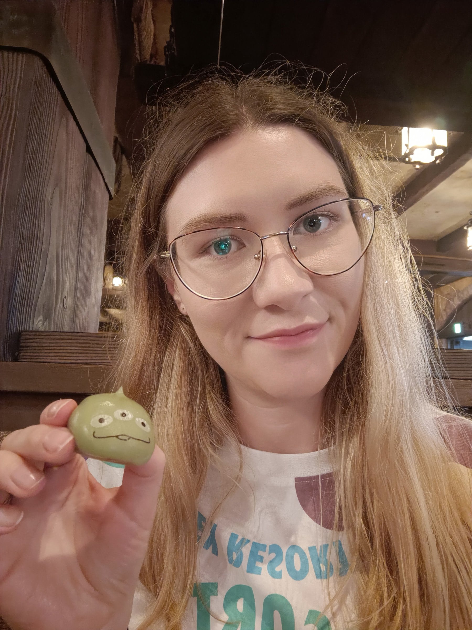 Lucy with one of the aliens.