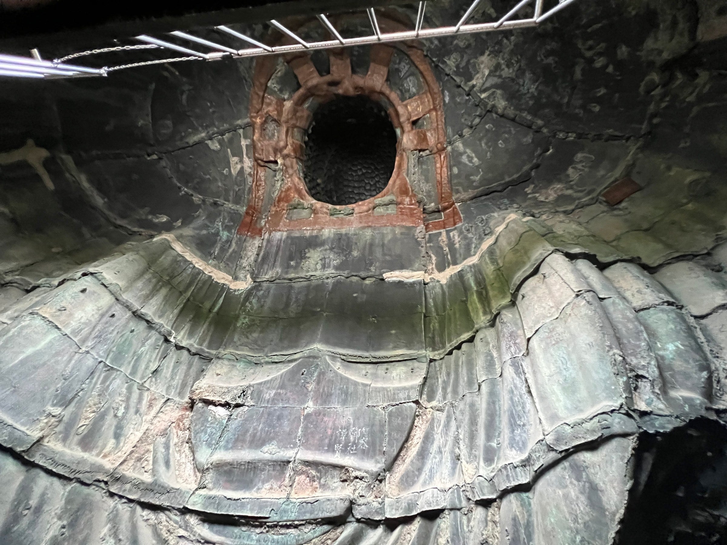 Looking up from inside the bronze statue.