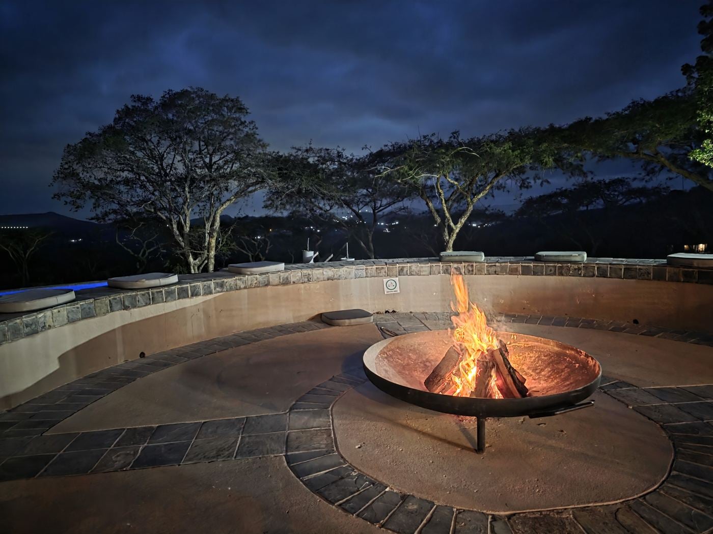 A fire pit at dusk on the reserve