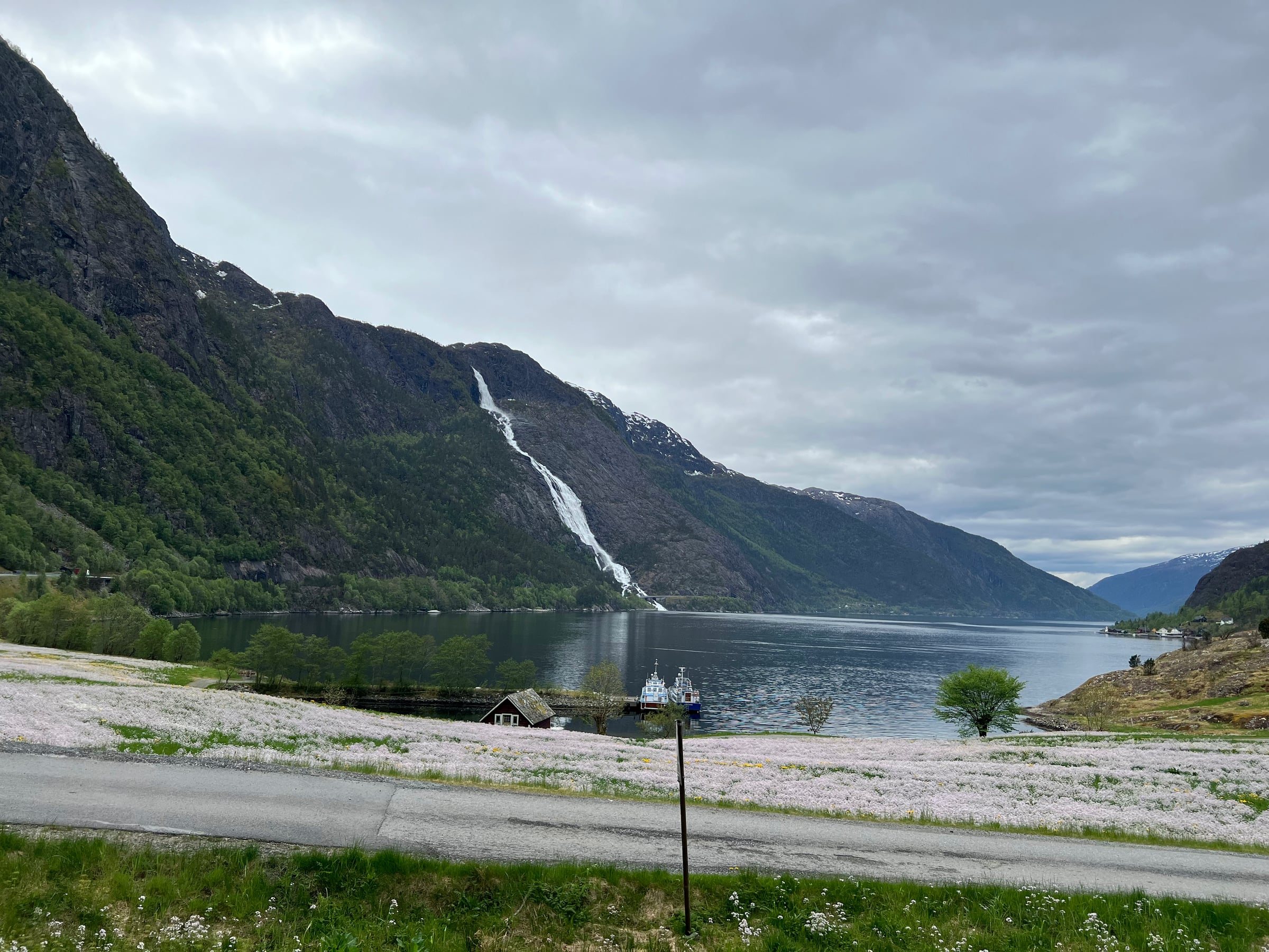 Langfoss dropping down the mountainside towards Åkrafjorden.