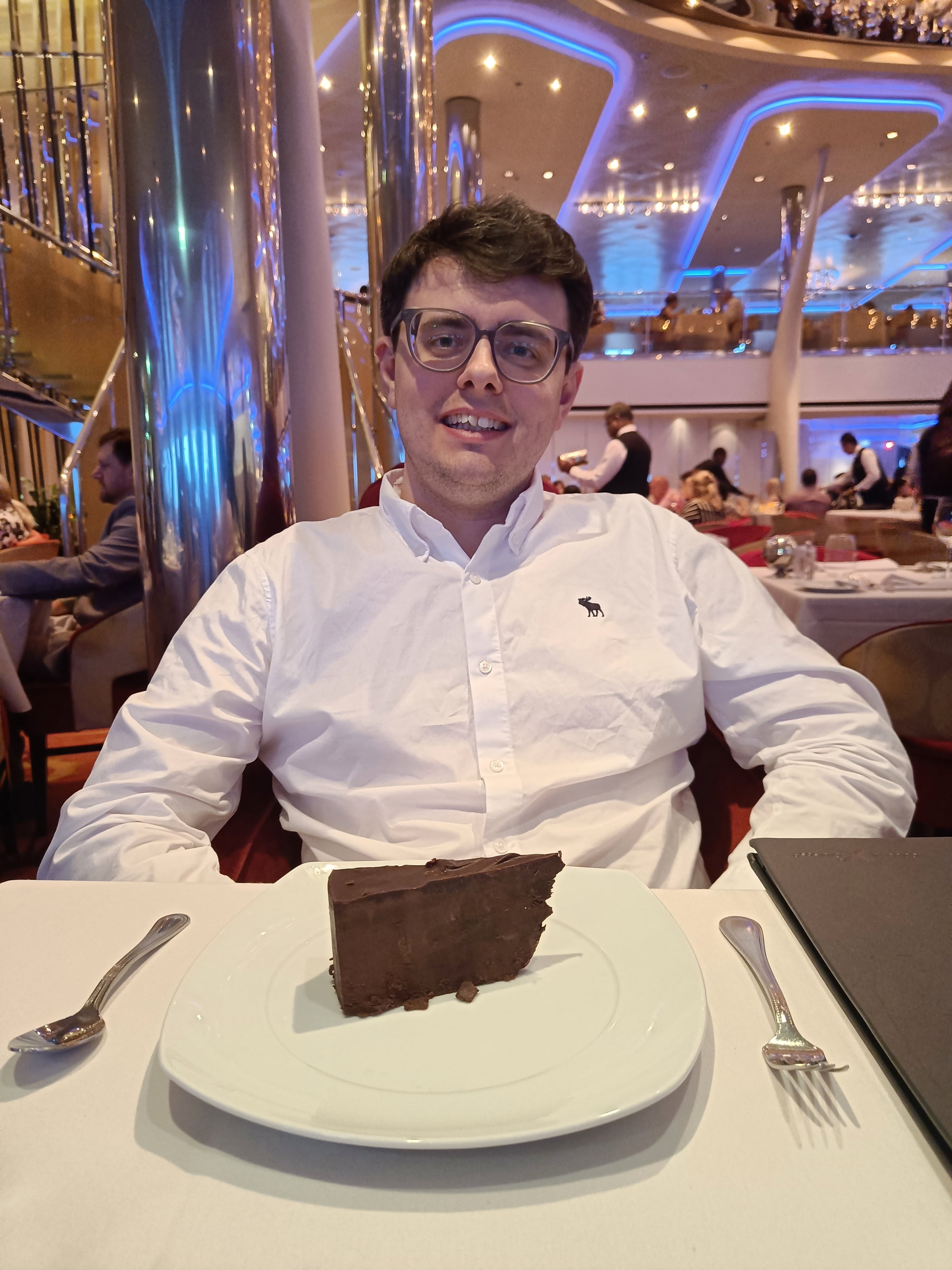 Harry enjoying dessert onboard.