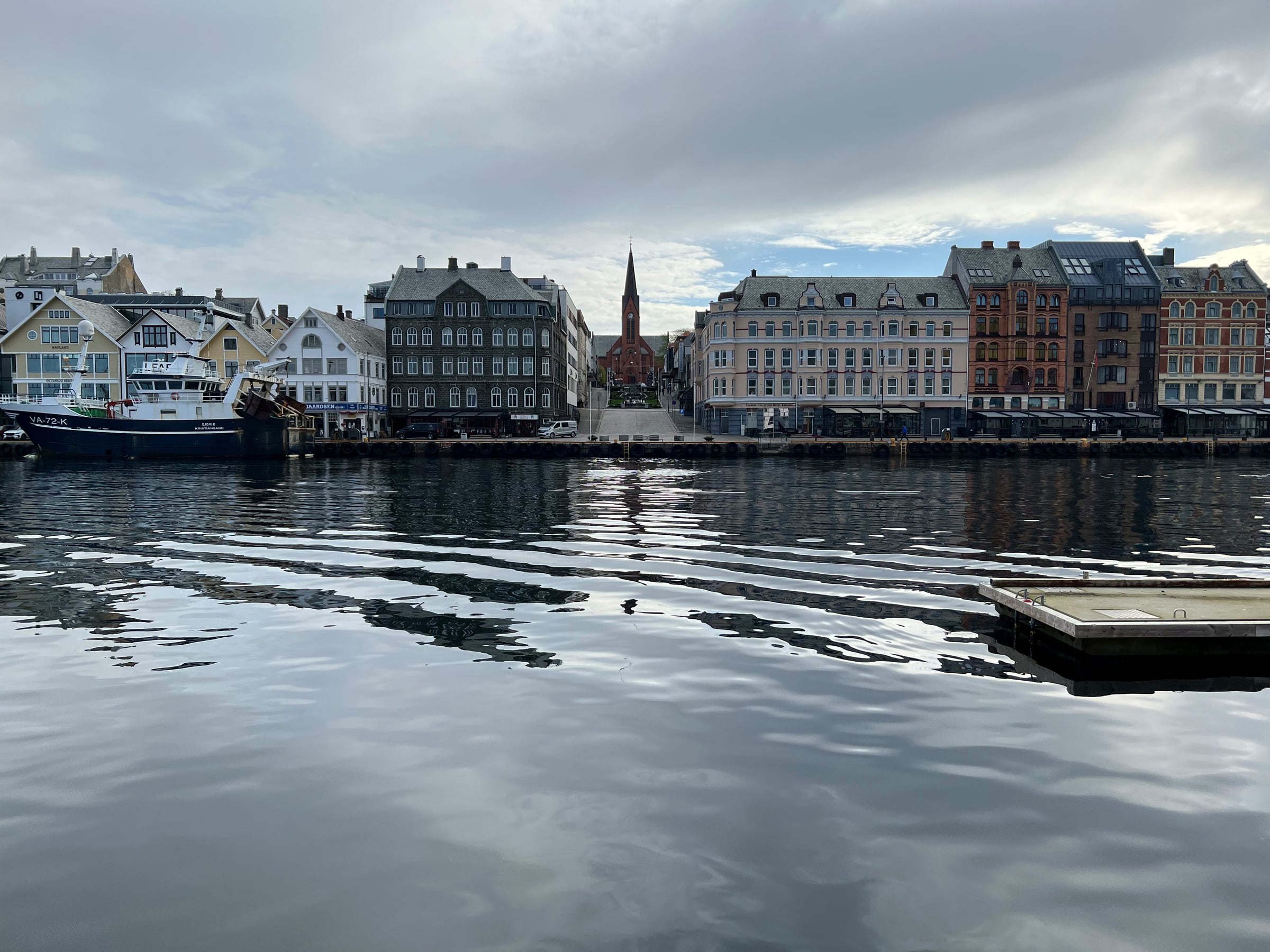 Buildings reflected in the water in Haugesund.