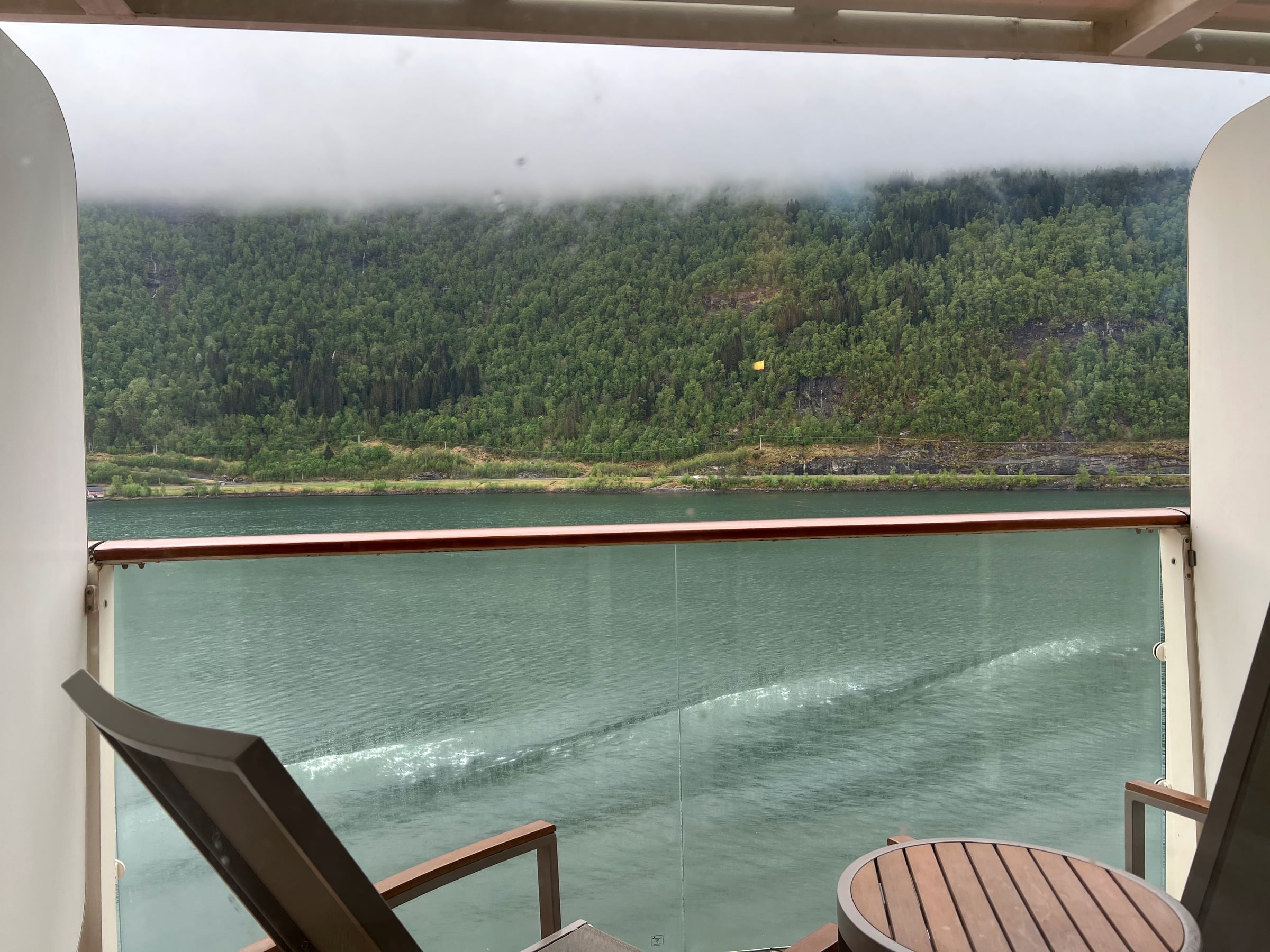 Low cloud over the wooded slopes outside our balcony in Olden.