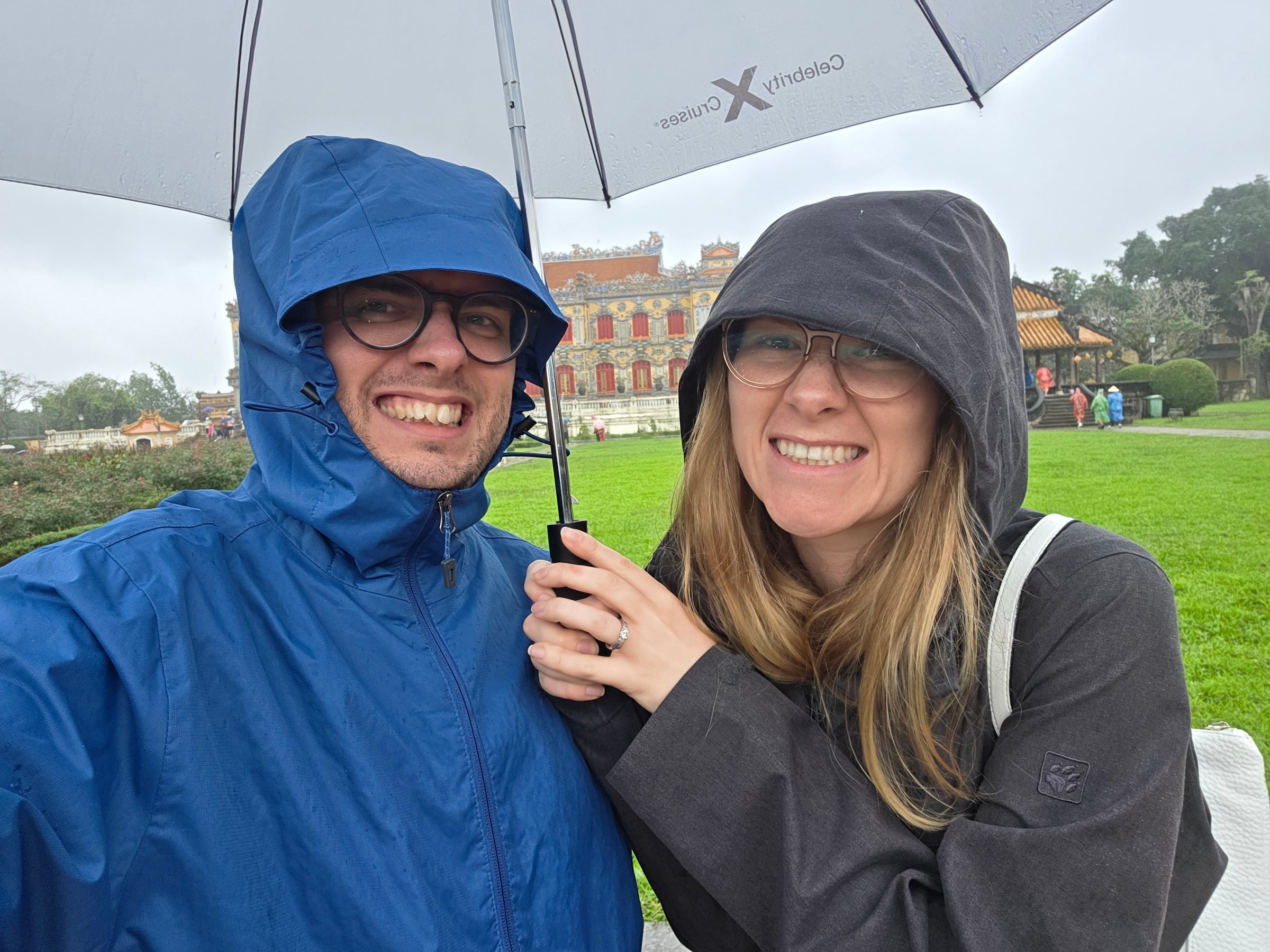 Sharing an umbrella at the Imperial City.